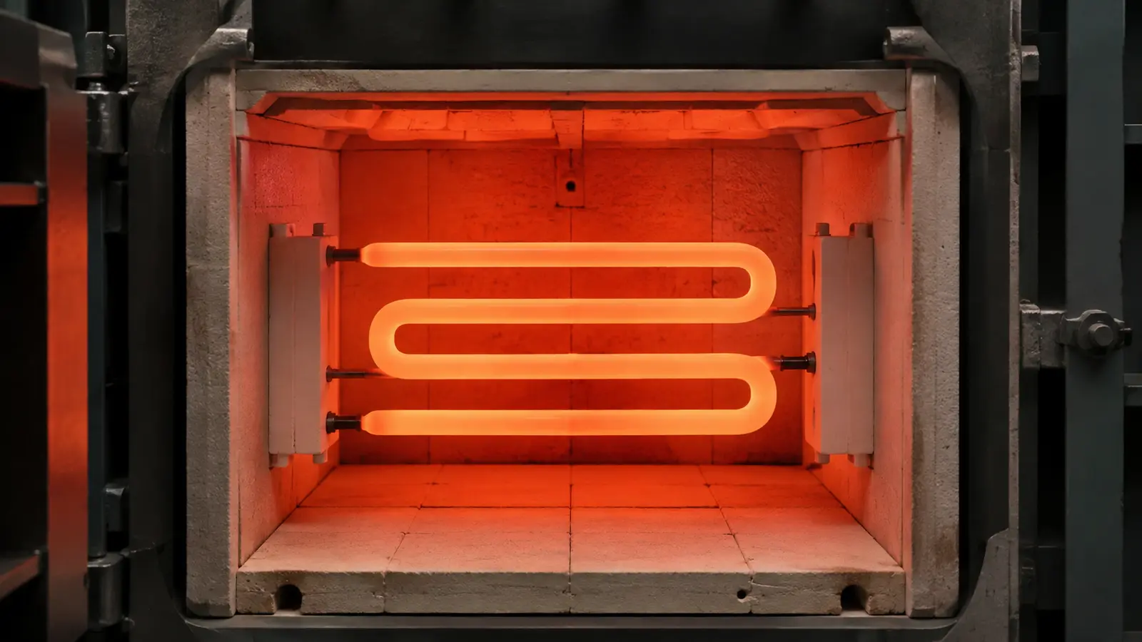 Graphite resistance heating element mounted inside a high-temperature furnace chamber.