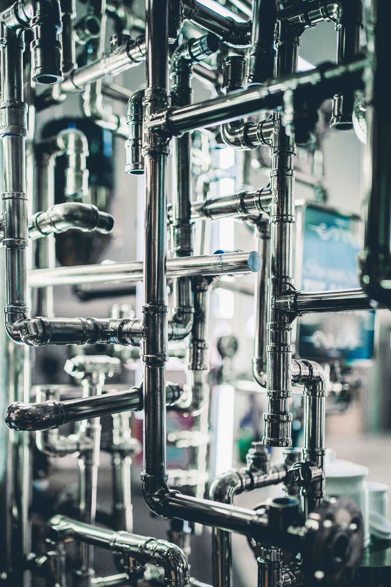 Industrial stainless-steel pipework used for spiral-wound gasket selection.