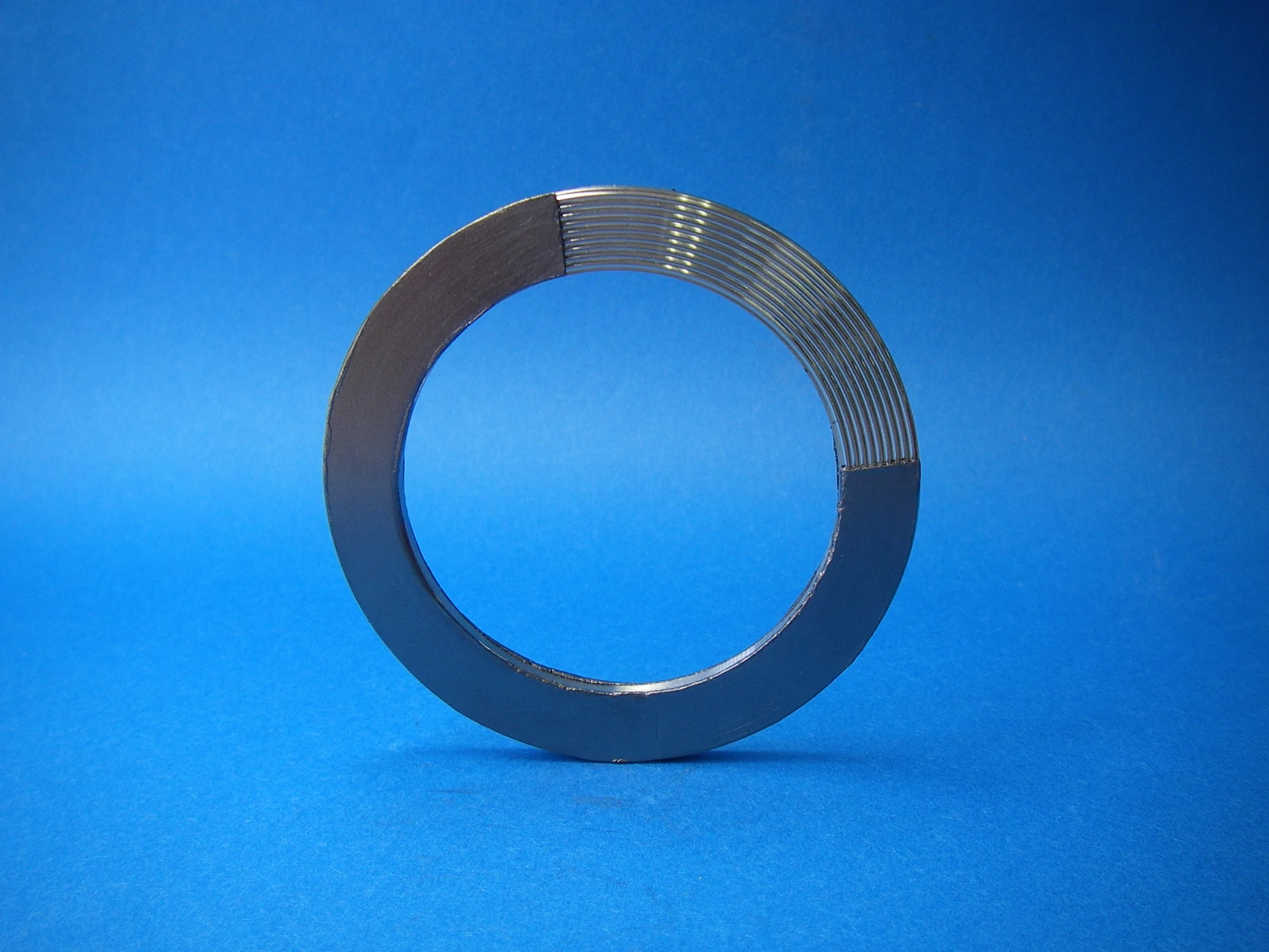 Kammprofile gasket for reinforced graphite foil vs tanged.