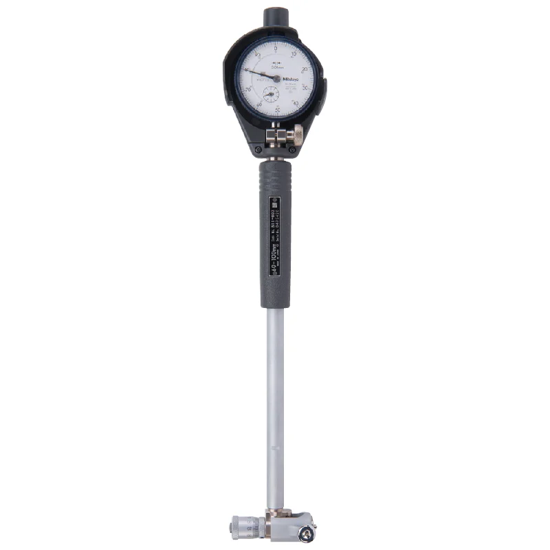 Bore gauge measuring internal diameter tolerance of a precision graphite sleeve.
