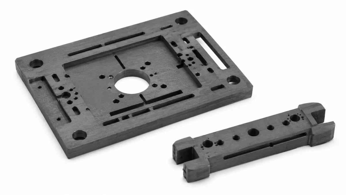 Precision machined graphite components featuring thin walls and small-diameter hole arrays.