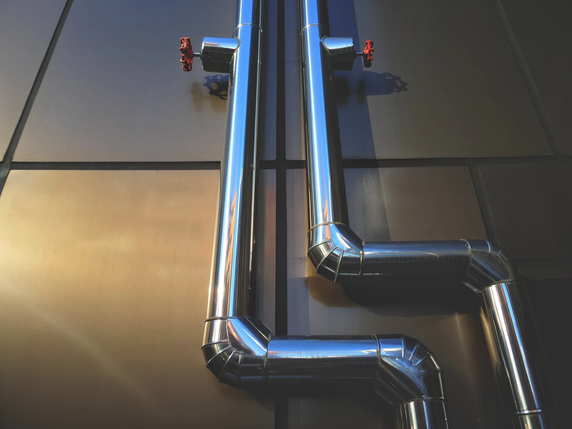 Stainless-steel piping with valve wheels used for low-sulfur flexible graphite specification.