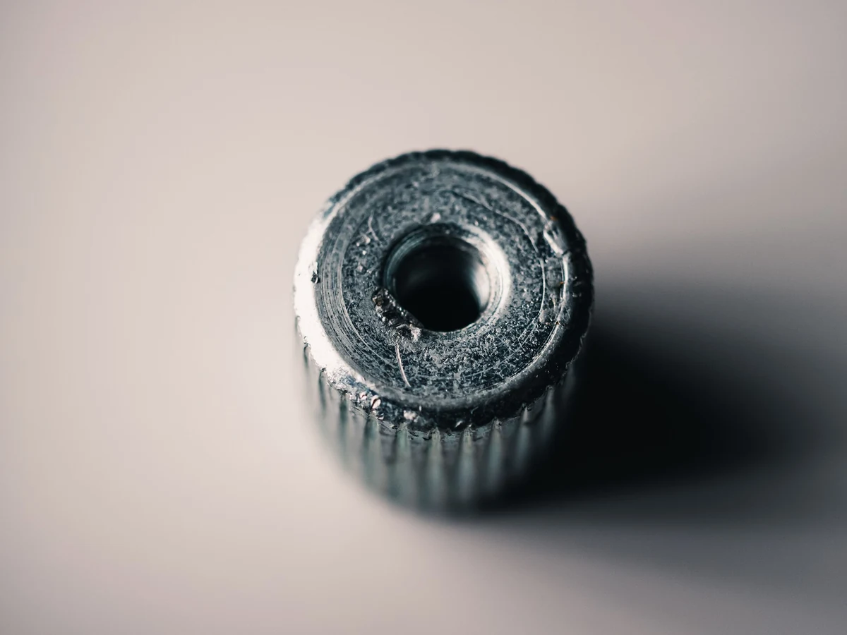 Metric thread pitch gauge for machined graphite threads.